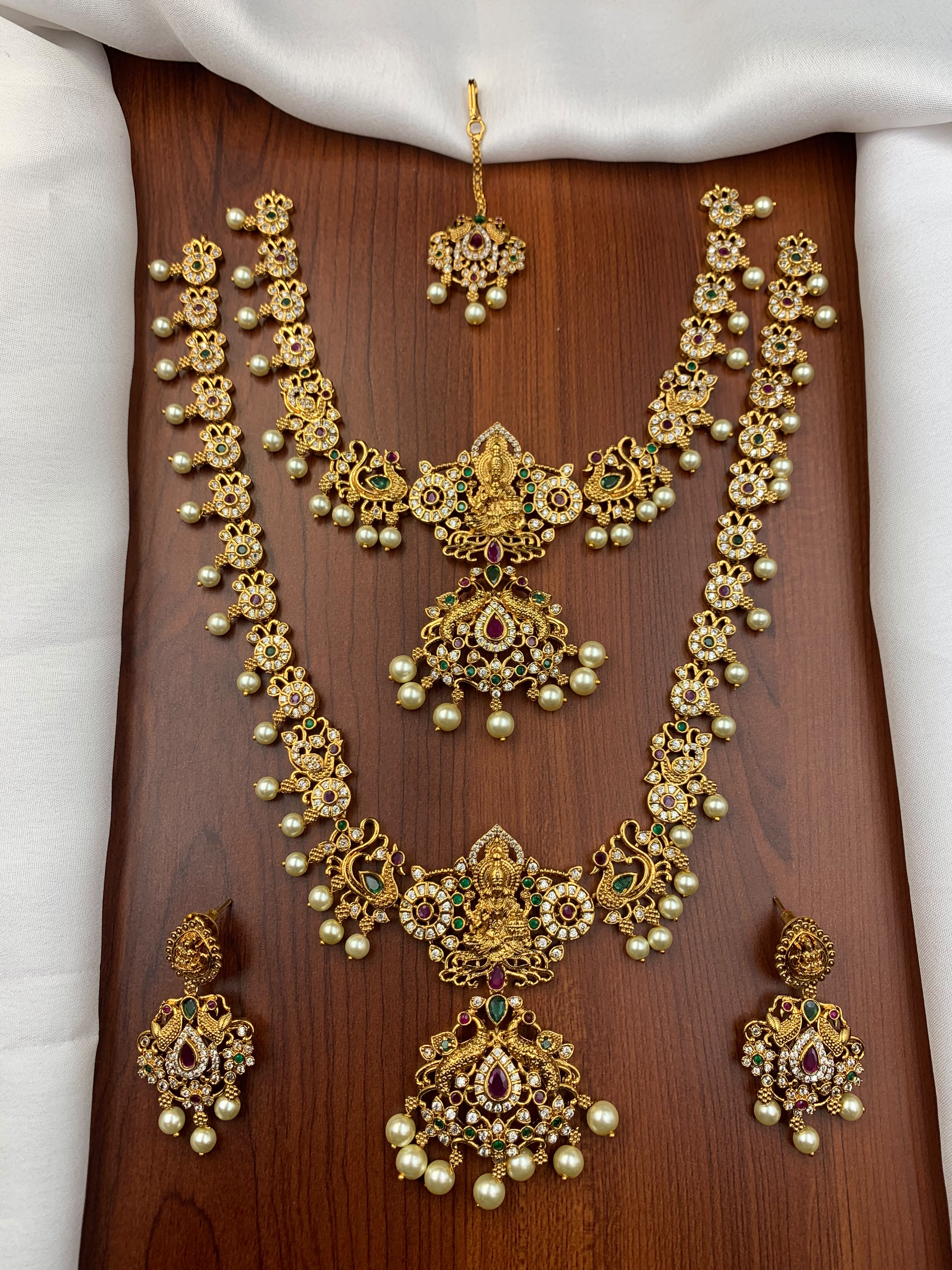 Gold-tone temple necklace set with peacock motifs