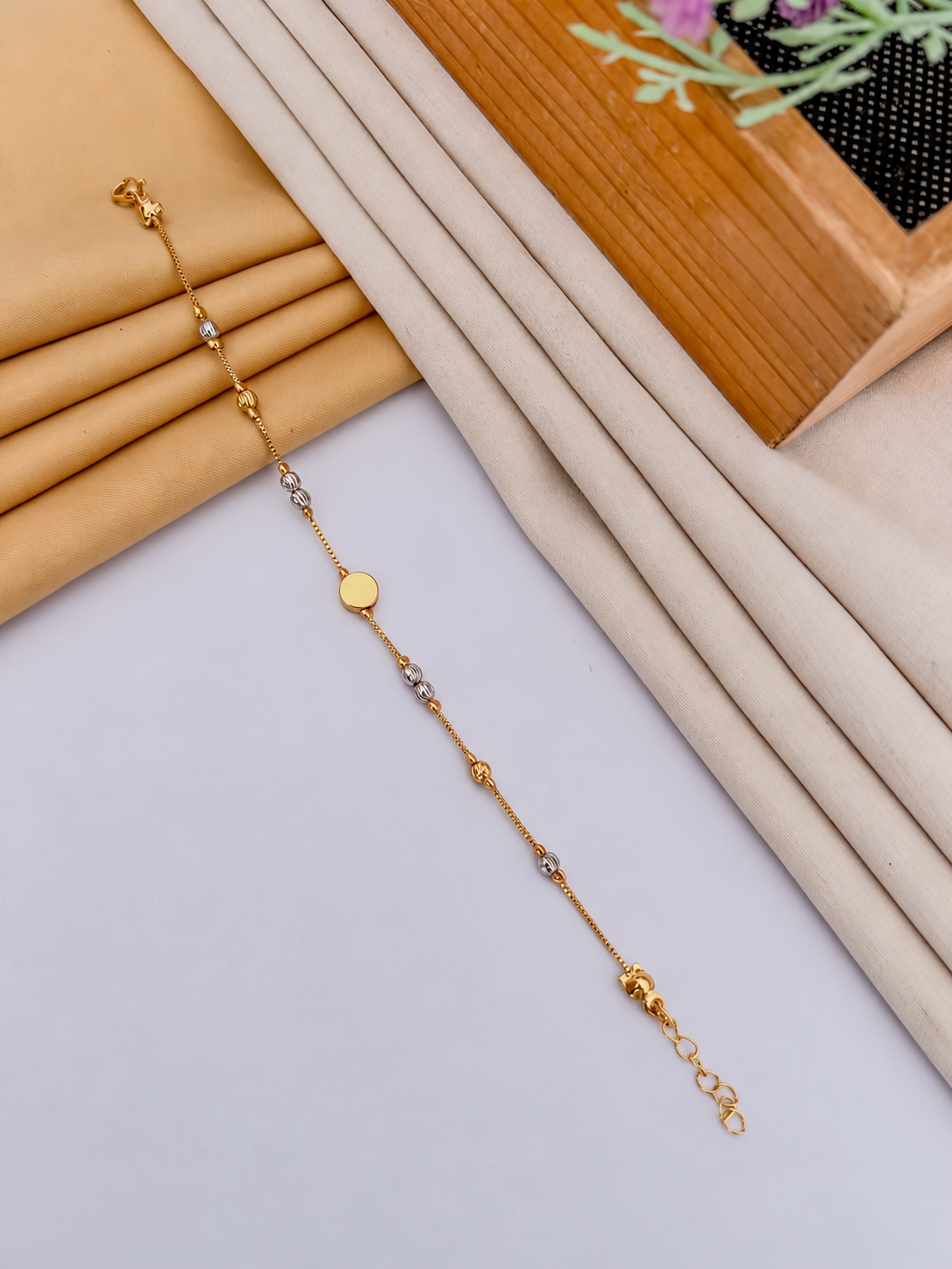 Minimal gold and silver disc bracelet