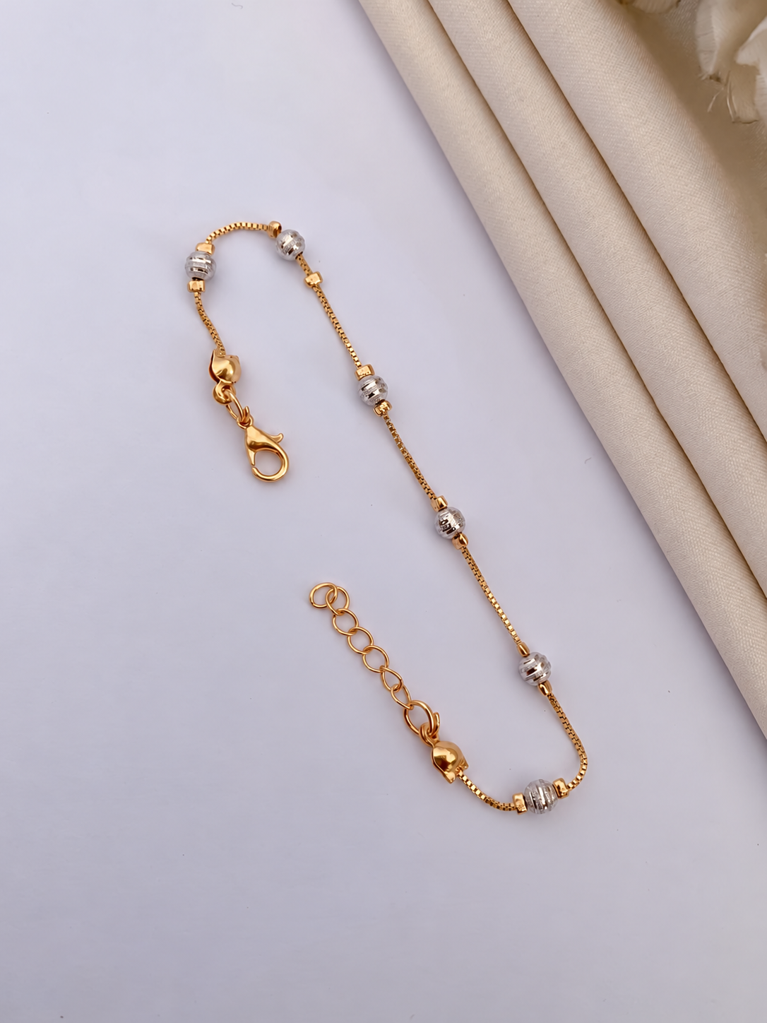 Silver bead gold chain bracelet
