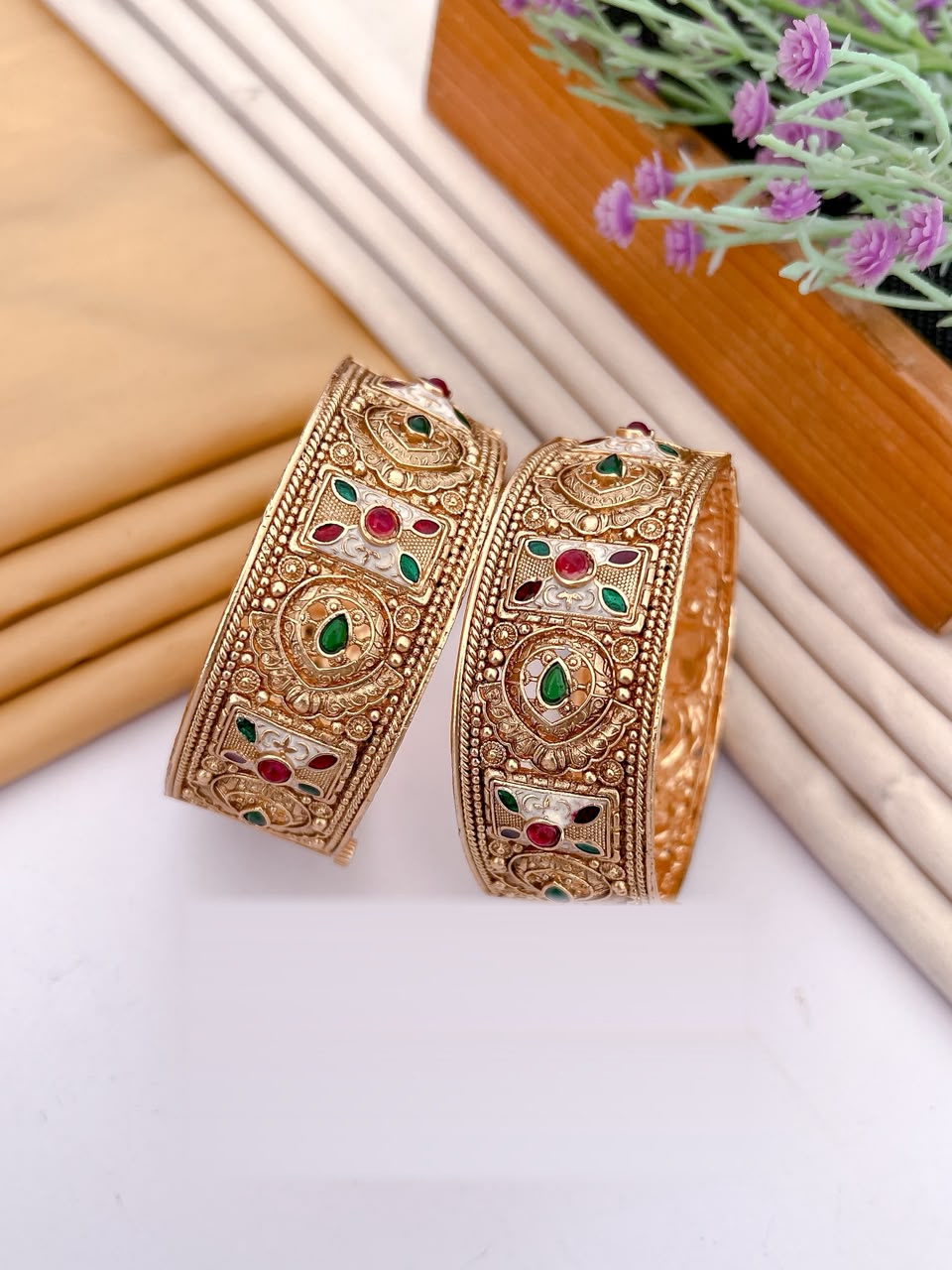 Floral oval gold tone openable bangle pair